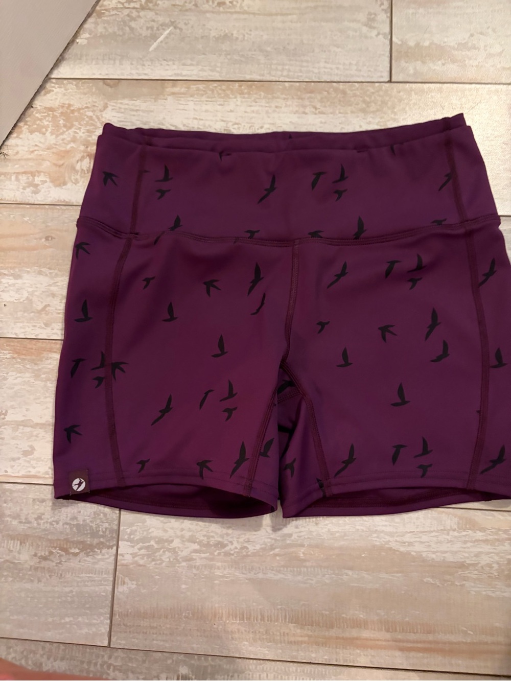 oiselle Plum Bike Shorts with Black Bird Print